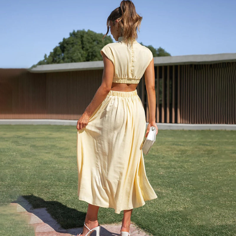 Monique - Pleated dress with high neck